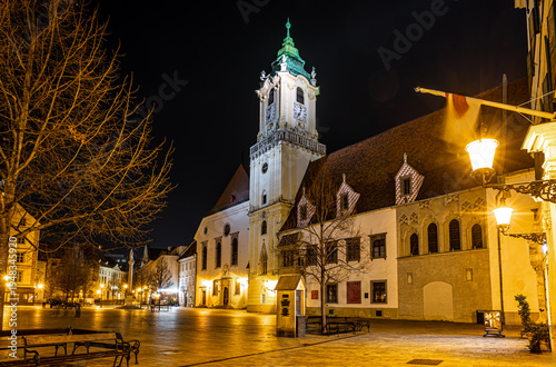 Canvas Print Bratislava Old Town night scene with church tower and glowing street view