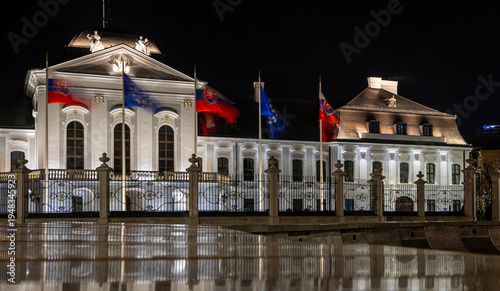 Photography Presidential Palace Bratislava at night with illuminated facade reflection