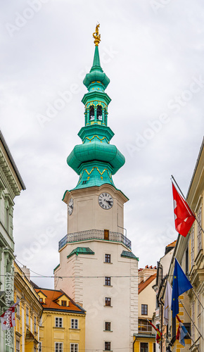 Photography Michaels Gate Bratislava Old Town street view with pedestrians and tower