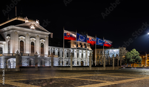 Canvas Print Presidential Palace Bratislava at night with illuminated facade reflection