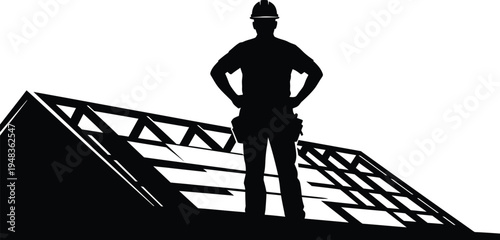 Construction worker silhouette on roof top during building construction