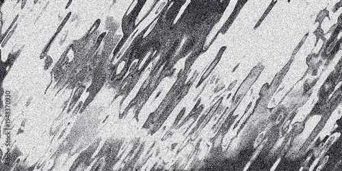 Dynamic monochrome abstract background with diagonal streaks of dark grainy texture and speckled noise creating a sense of motion and visual interest for digital art