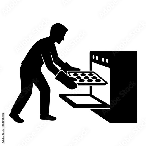 Minimalist black silhouette of a person wearing oven mitts and putting a tray of cookies into an oven for home baking and culinary preparation.
