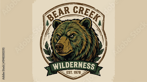 Vintage Bear Creek Wilderness Logo with Grizzly Bear Head.
