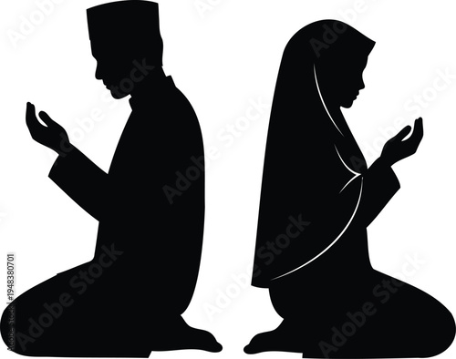 Silhouette of two people praying during the holy month of ramadan