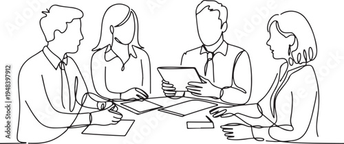 Business people in meeting discussing documents at table