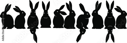 Black silhouettes of rabbits in various poses on white background animals bunny