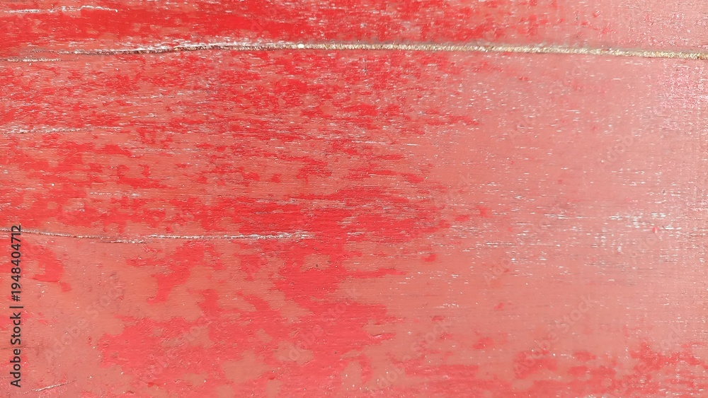Fototapeta premium Weathered Red Painted Wood Texture. Close up of aged red painted wooden surface with peeling paint and distressed texture