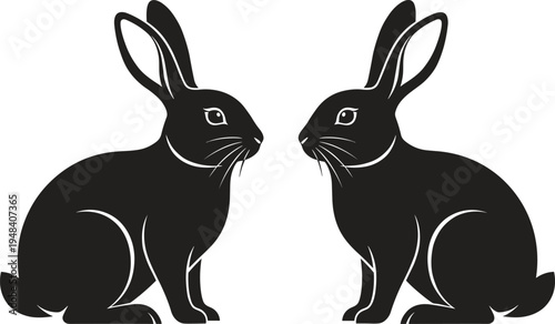 Two black rabbits sitting facing each other white background 2