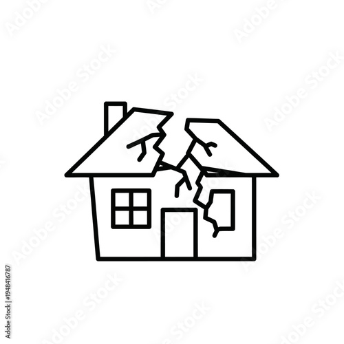 Damaged house with broken roof line.