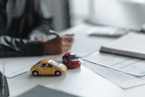Businessman agent with insurance policy about car contract.Salesman Automobile Vehicles Concept