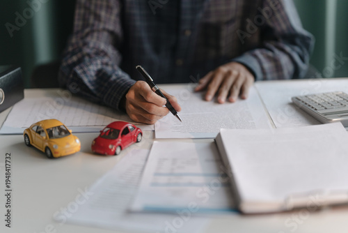 Businessman agent with insurance policy about car contract.Salesman Automobile Vehicles Concept