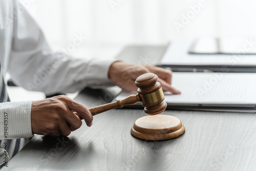 Obraz na płótnie Lawyer businessman analyzes legal brief in office