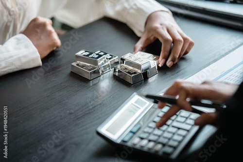 Businesspeople analyzes silver investment trends for financial success