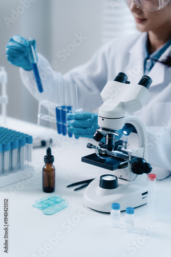 Scientists researching biochemical in a laboratory, Science experiment