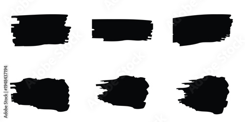 Collection of six diverse black paint brush stroke shapes isolated on a transparent background for graphic design
