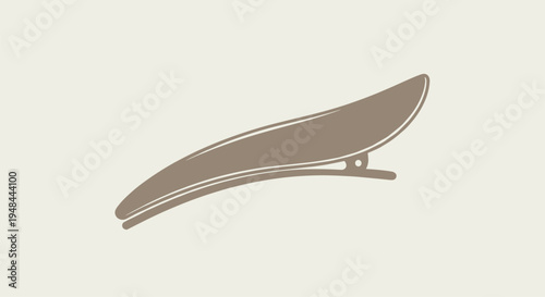 Stylish beige banana hair clip, an elegant hair accessory perfect for securing and styling hair in a comfortable and fashionable way.