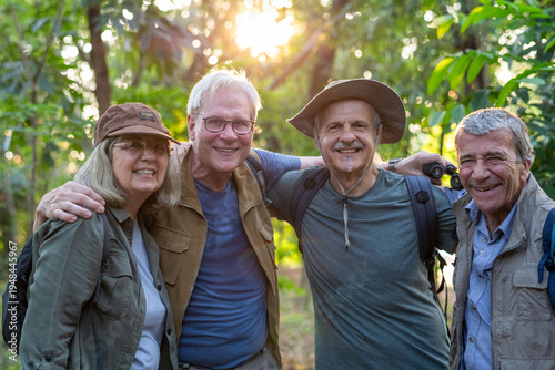 Photos Happy seniors exploring nature together.