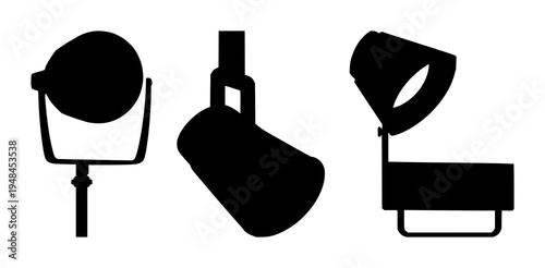 Spotlight set with solid black silhouette on white background featuring film noir, theatrical lighting, stage illumination with dramatic and monochrome