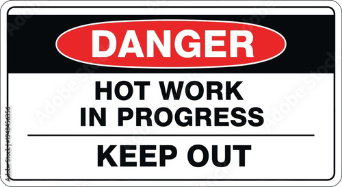 Warning sign indicating hot work in progress at industrial site