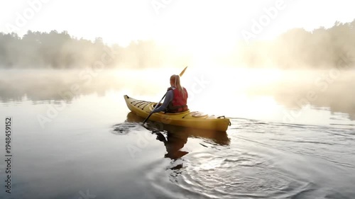 Kayaking on a Misty Lake - A Serene Morning Adventure.