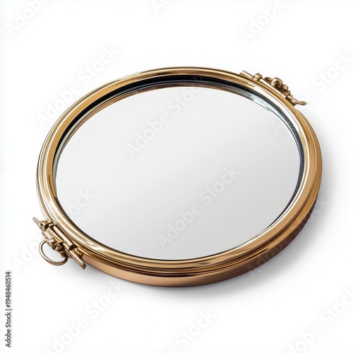 Round Gold Mirror Placed on a Surface With Bright Reflections Showing Its Smo...
