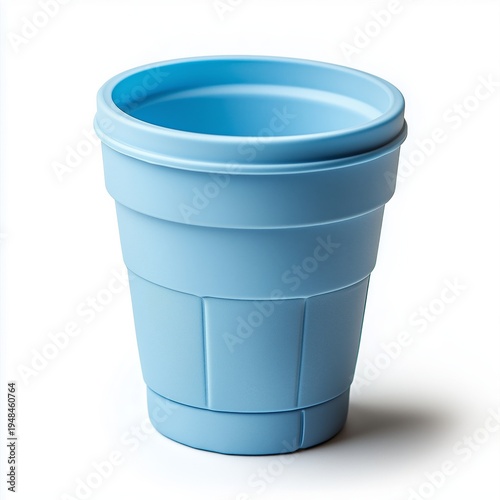 Blue Plastic Cup Rests on a White Surface Under Bright Light in a Simple Indo...