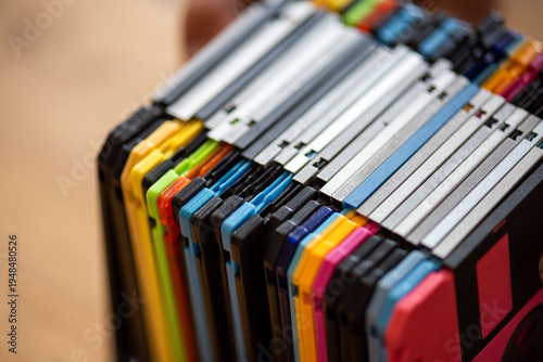 Canvas Print Colorful vintage floppy disks stack.