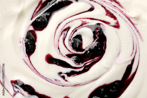 Delicious yogurt with blueberry jam as background, top view