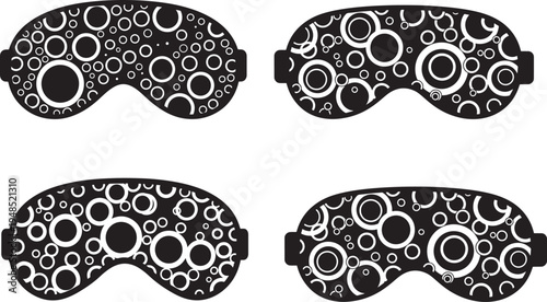 A collection of four black sleeping masks featuring unique white abstract circle pattern designs