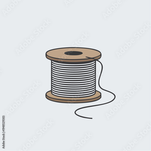 A spool of white wire on a wooden reel.