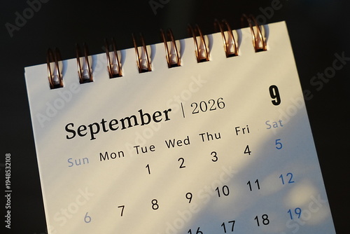 Close-up of a calendar displaying the month of September 2026. Clean design with prominent numbers and dates visible. Useful for planning, scheduling, or time management visuals.