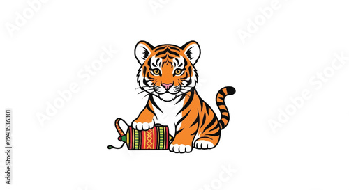 A playful tiger cub sitting with a wrapped gift box indoors.