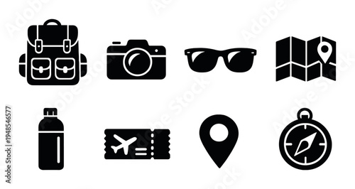 Backpack, photography device, sunglasses and map on dark background