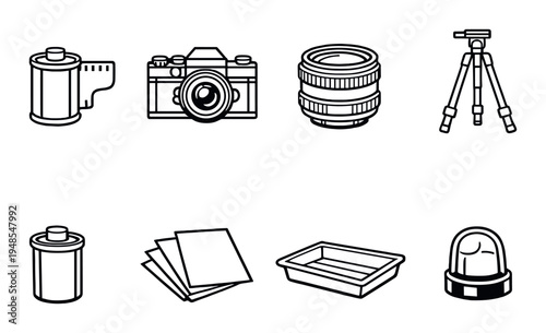 Film photography tools arranged in grid on dark background