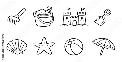 Beach toys and sandcastle icons arranged on dark background