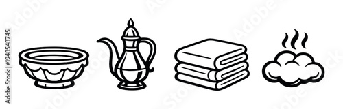 Ceramic bowl, teapot, folded towels and steam in sauna room