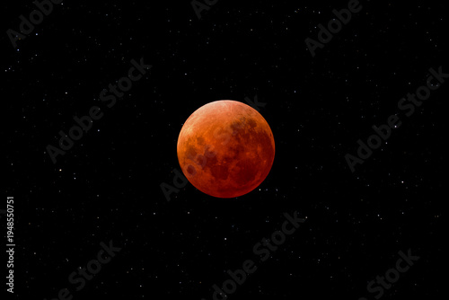 Total lunar eclipse of 3-4 March 2026 showing the eclipsed moon and the background stars of the constellation Leo