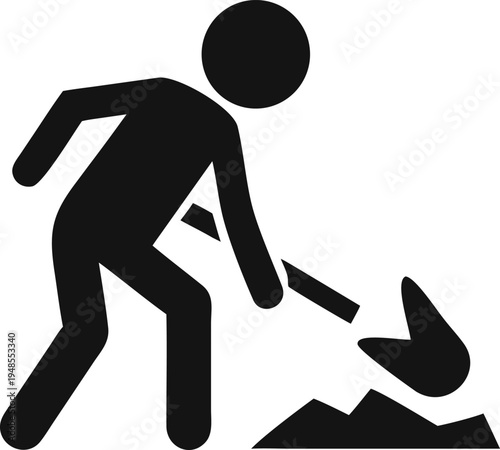 Worker actively digging soil with a shovel at a construction site or garden