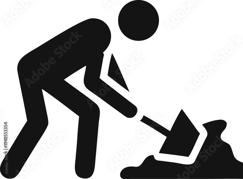 Worker Digging Earth with a Shovel to Create a Mound of Soil