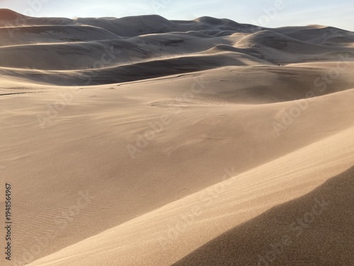 Fotografija Great Sand Dunes National Park, Colorado, USA – hikers vanish into windblown san