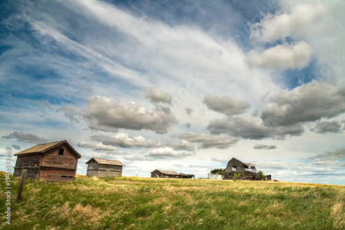 Canada, Saskatchewan, Biggar.  Delapidated farm buildings in the great Canadian prairie.