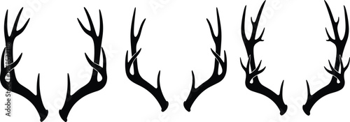 Set of black deer antler silhouettes featuring various trophy buck horns isolated on white background for hunting and nature design.