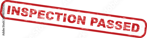 Red rubber stamp with bold uppercase text inspection passed