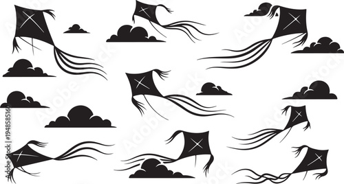 Kite Silhouettes Flying in the Windy Sky with Clouds