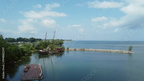 La Grande Hermine, or Jordan Harbour Shipwreck, along the QEW in southwestern Ontario, Canada, on the southern shore of Lake Ontario. Aerial shot from a drone at a low altitude, moving forward. 2021.