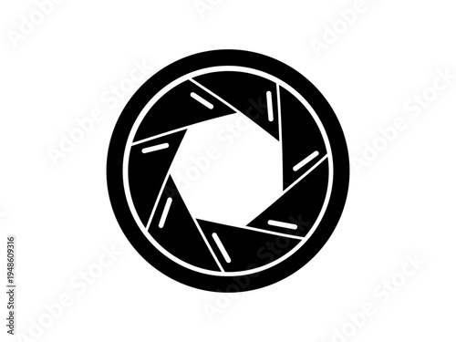 Black camera lens icon in a simple flat silhouette style.