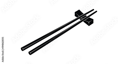 Black chopsticks and a cube rest on a plain white background