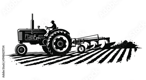 A vintage tractor plows a field driven by a farmer in black and white