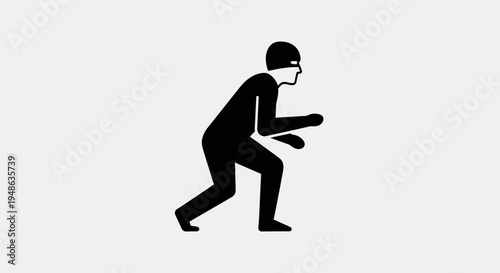 Stealthy Thief Icon: Silhouette of a Burglar in a Mask, Crouching and Sneaking